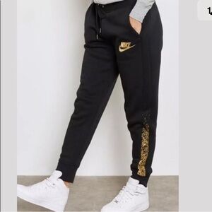 Nike Womens Rally Joggers Black Metallic Gold XS